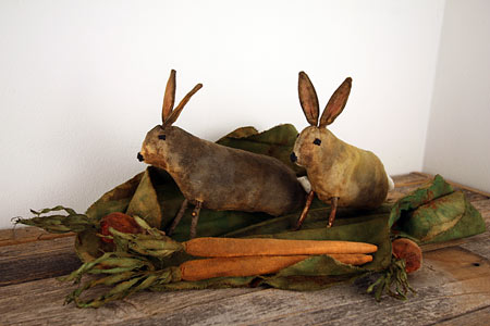 primitive bunnies in a cabbage leaf garden